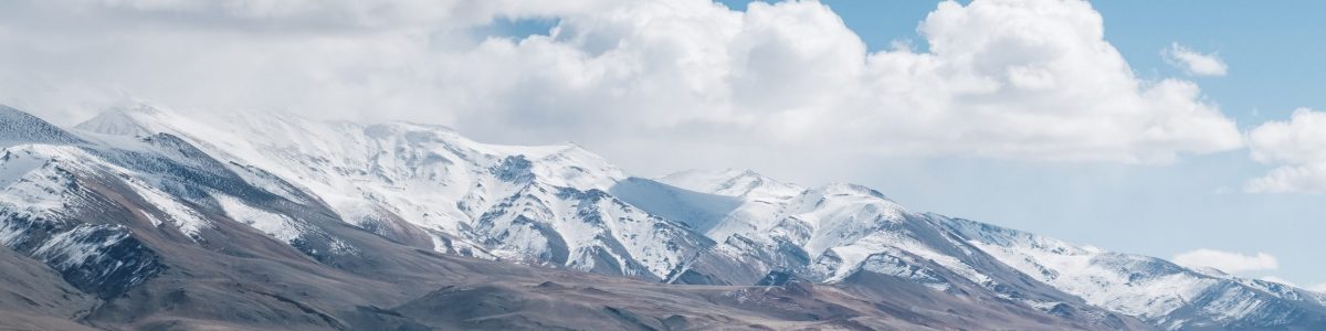 women at Pangong lake and mountain in Leh Ladakh, India